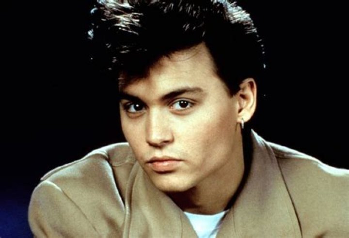 Does Johnny Depp have his ears pierced?