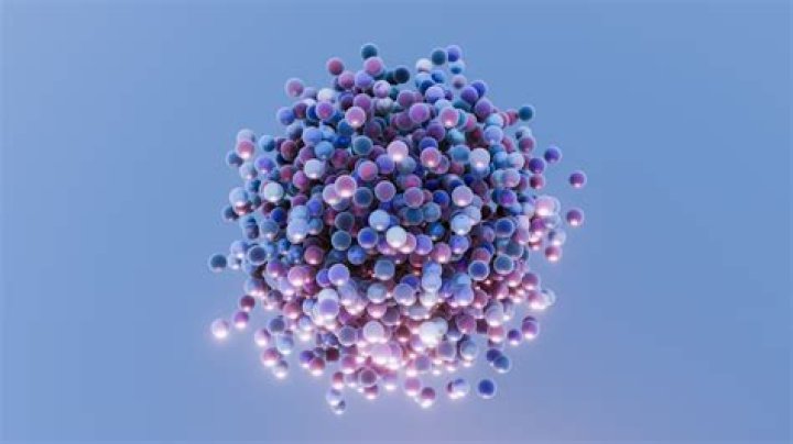 How are atomic nuclei charged?