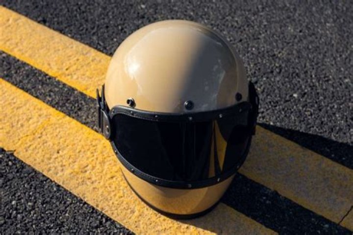 Should a motorcycle helmet squeeze your cheeks?