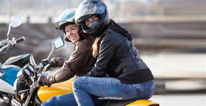 Should a passenger on a motorcycle lean with the driver?