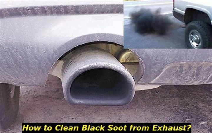 What causes black soot in exhaust?