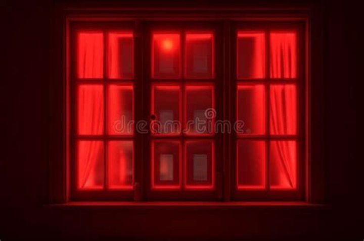 What does a red light in a house window mean?