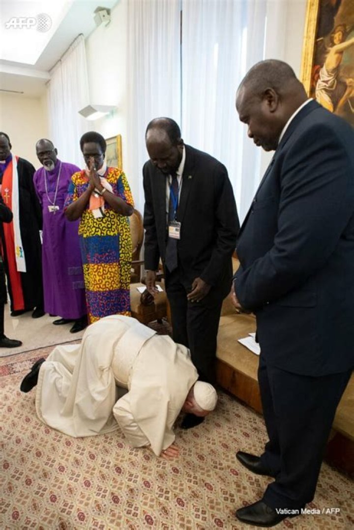 Why does the pope kiss feet?